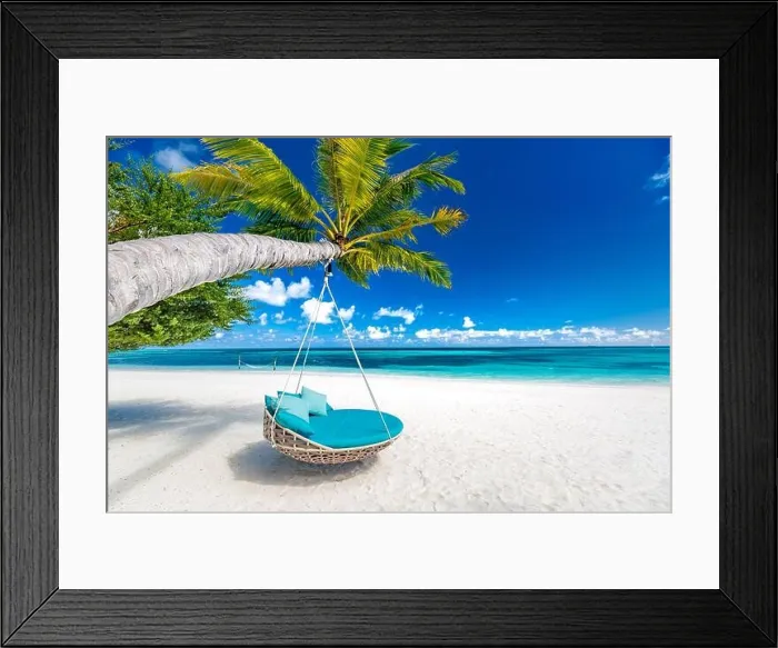 Framed Print : Tropical beach background as summer landscape with beach swing or hammock and white sand and calm sea for beach banner. Perfect beach scene vacation Framed Print : Tropical beach background as summer landscape with beach swing or hammock and white sand and calm sea for beach banner. Perfect beach scene vacation