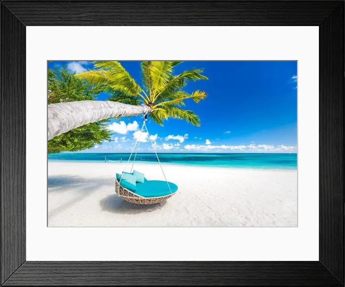 Framed Print : Tropical beach background as summer landscape with beach swing or hammock and white sand and calm sea for beach banner. Perfect beach scene vacation Framed Print : Tropical beach background as summer landscape with beach swing or hammock and white sand and calm sea for beach banner. Perfect beach scene vacation