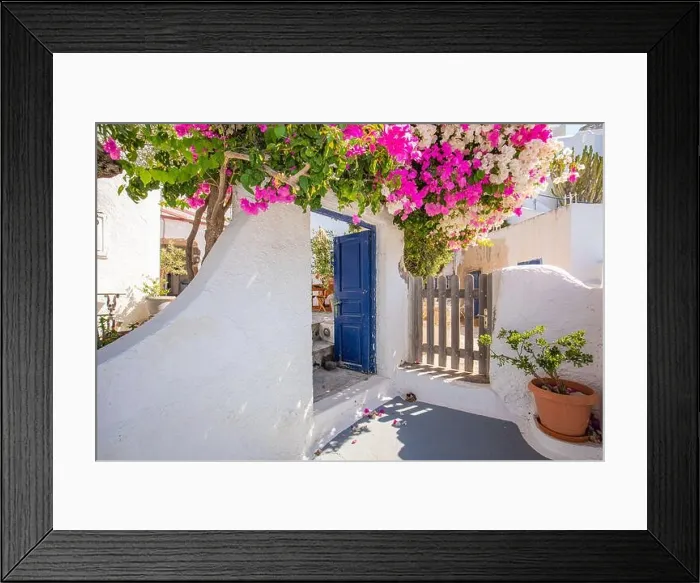 Framed Print : Greek island of Santorini. Amazing travel panorama, white houses, stairs and flowers on the streets. Idyllic summer vacation, urban landscape, tourism Framed Print : Greek island of Santorini. Amazing travel panorama, white houses, stairs and flowers on the streets. Idyllic summer vacation, urban landscape, tourism
