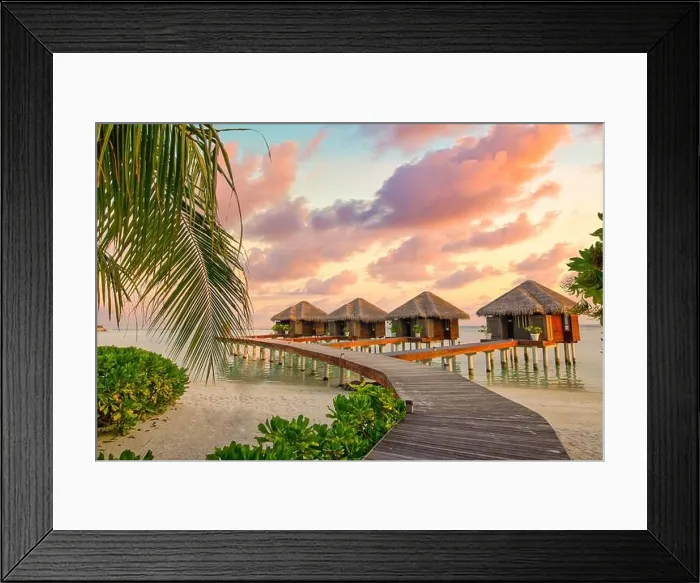 Framed Print : Amazing sunset panorama at Maldives. Luxury resort villas seascape with soft led lights under colorful sky. Beautiful twilight sky and colorful clouds Framed Print : Amazing sunset panorama at Maldives. Luxury resort villas seascape with soft led lights under colorful sky. Beautiful twilight sky and colorful clouds