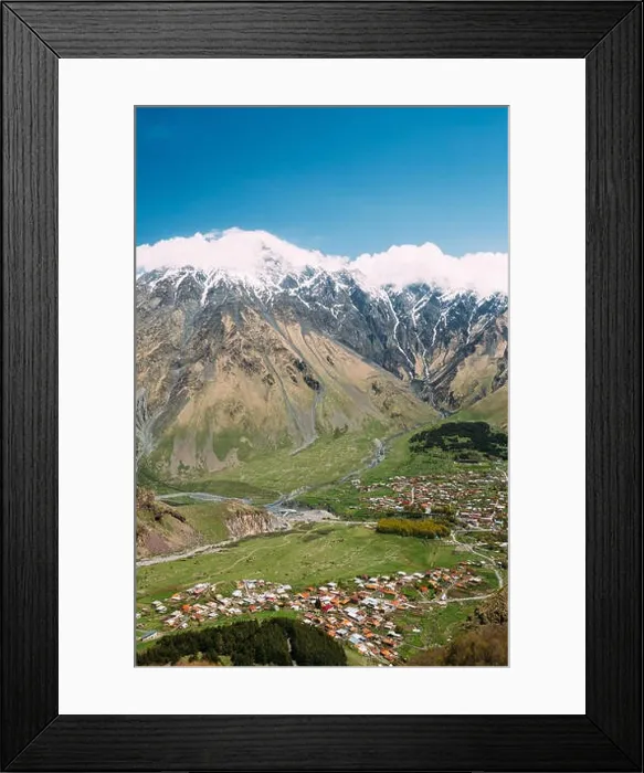 Framed Print : Stepantsminda Village At Sunny Day In Kazbegi District, Mtskheta-Mtianeti Region, Georgia. Spring Or Summer Season Mountains Landscape Framed Print : Stepantsminda Village At Sunny Day In Kazbegi District, Mtskheta-Mtianeti Region, Georgia. Spring Or Summer Season Mountains Landscape
