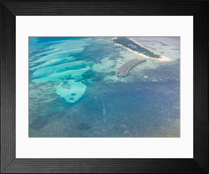 Framed Print : Maldives island aerial landscape view. Beautiful blue sea and luxury water villas. Seaplane aerial view of Maldives atoll and coral reef Framed Print : Maldives island aerial landscape view. Beautiful blue sea and luxury water villas. Seaplane aerial view of Maldives atoll and coral reef