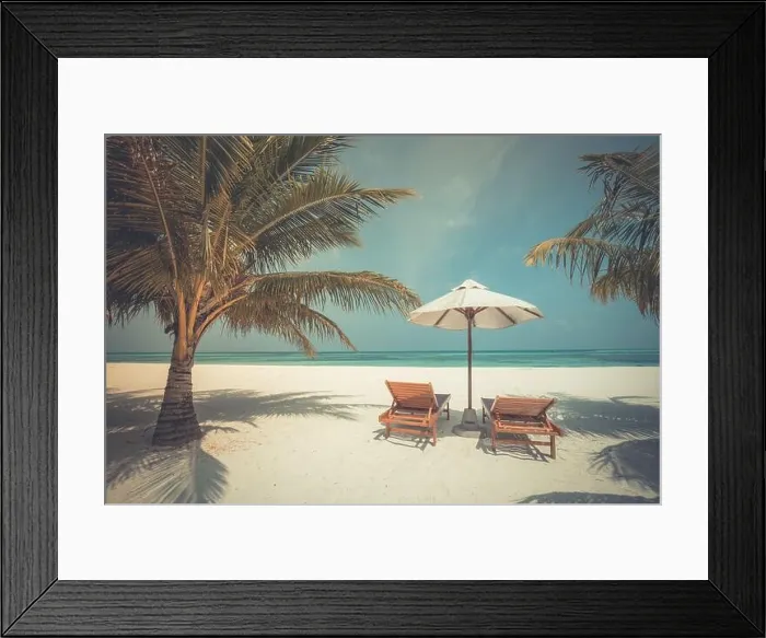 Framed Print : Beautiful tropical beach, two sun beds, loungers, umbrella under palm tree. White sand, sea view horizon, blue sky, calmness and relax resort scenery Framed Print : Beautiful tropical beach, two sun beds, loungers, umbrella under palm tree. White sand, sea view horizon, blue sky, calmness and relax resort scenery