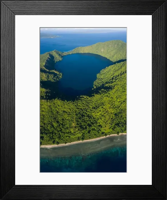 Framed Print : Seen from a bird's eye view, the blue Pacific Ocean surrounds the scenic volcano of Satonda, just north of the island of Sumbawa in Indonesia Framed Print : Seen from a bird's eye view, the blue Pacific Ocean surrounds the scenic volcano of Satonda, just north of the island of Sumbawa in Indonesia
