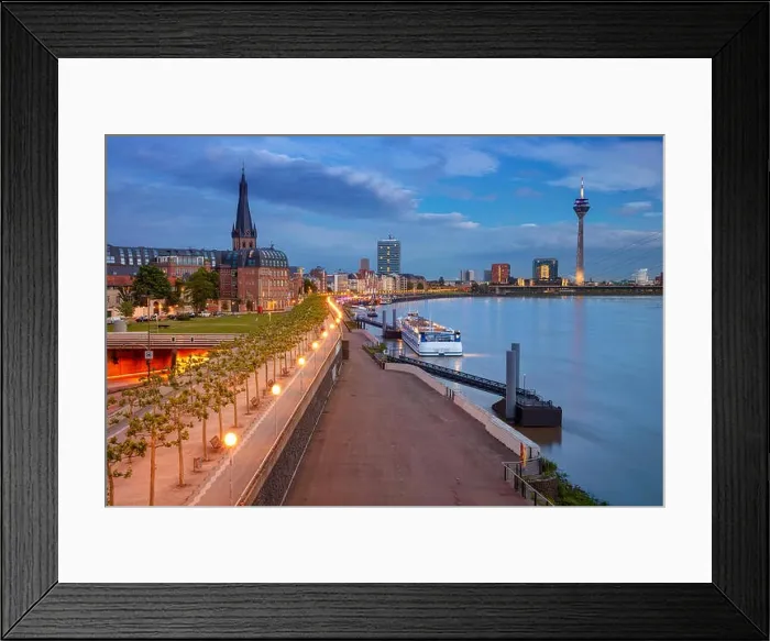Framed Print : Dusseldorf, Germany. Cityscape image of riverside Düsseldorf, Germany with Rhine river during sunset Framed Print : Dusseldorf, Germany. Cityscape image of riverside Düsseldorf, Germany with Rhine river during sunset