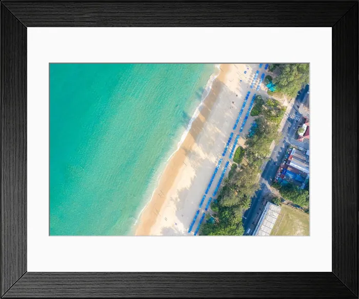 Framed Print : Aerial view of people swimming on the pink swim ring in the transparent turquoise sea in Phuket, Thailand Framed Print : Aerial view of people swimming on the pink swim ring in the transparent turquoise sea in Phuket, Thailand