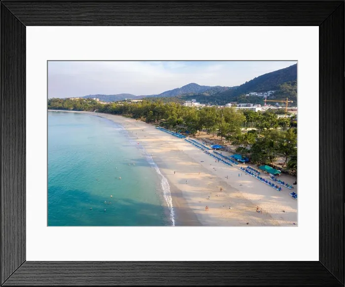 Framed Print : Aerial view of people swimming in the transparent turquoise sea at Karon beach in Phuket, Thailand Framed Print : Aerial view of people swimming in the transparent turquoise sea at Karon beach in Phuket, Thailand