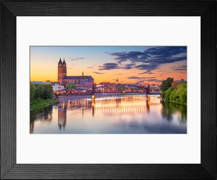 Framed Print : Magdeburg, Germany. Cityscape image of Magdeburg, Germany with reflection of the city in the Elbe river, during sunset Framed Print : Magdeburg, Germany. Cityscape image of Magdeburg, Germany with reflection of the city in the Elbe river, during sunset