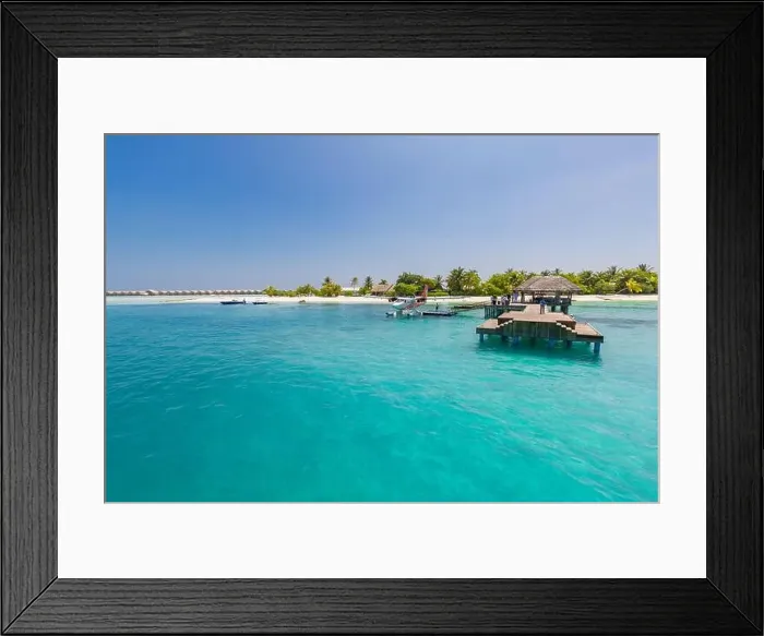 Framed Print : Wooden pier and jetty with seaplane at tropical island resort, Maldives. Luxury summer travel. Arrive at summer holiday vacation island landscape Framed Print : Wooden pier and jetty with seaplane at tropical island resort, Maldives. Luxury summer travel. Arrive at summer holiday vacation island landscape