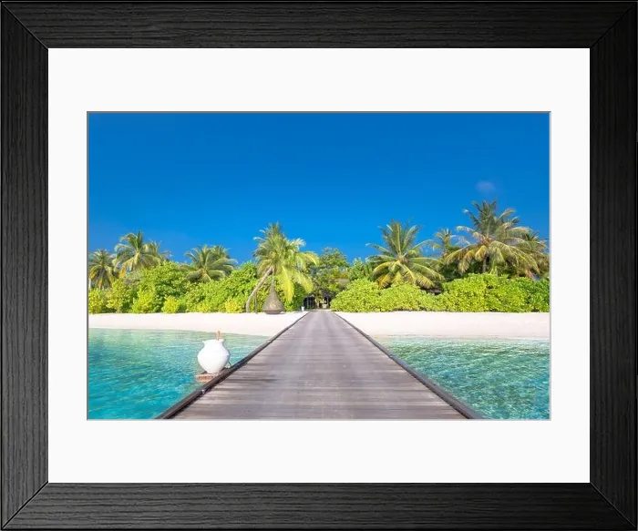 Framed Print : Beautiful tropical Maldives island with beach jetty sea and coconut palm tree on blue sky. Luxury summer nature holiday vacation background concept Framed Print : Beautiful tropical Maldives island with beach jetty sea and coconut palm tree on blue sky. Luxury summer nature holiday vacation background concept