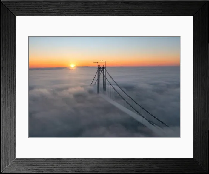 Framed Print : Panoramic aerial drone view from above of the suspended bridge over danube river, under construction, between Braila and Tulcea cities in Romania