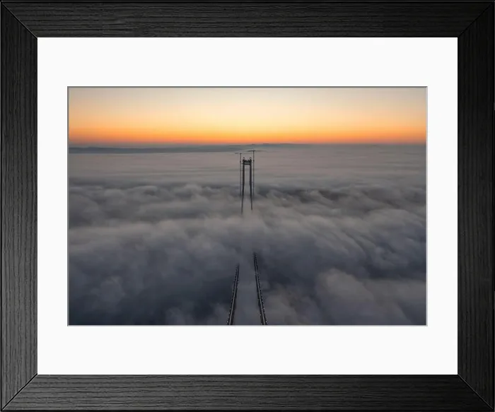 Framed Print : Panoramic aerial drone view from above of the suspended bridge over danube river, under construction, between Braila and Tulcea cities in Romania Framed Print : Panoramic aerial drone view from above of the suspended bridge over danube river, under construction, between Braila and Tulcea cities in Romania
