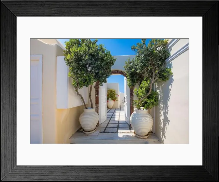 Framed Print : Oia town on Santorini island, Greece. Traditional famous white blue houses stairs, pathways under sunny blue sky Caldera, Aegean sea. Beautiful summer Framed Print : Oia town on Santorini island, Greece. Traditional famous white blue houses stairs, pathways under sunny blue sky Caldera, Aegean sea. Beautiful summer