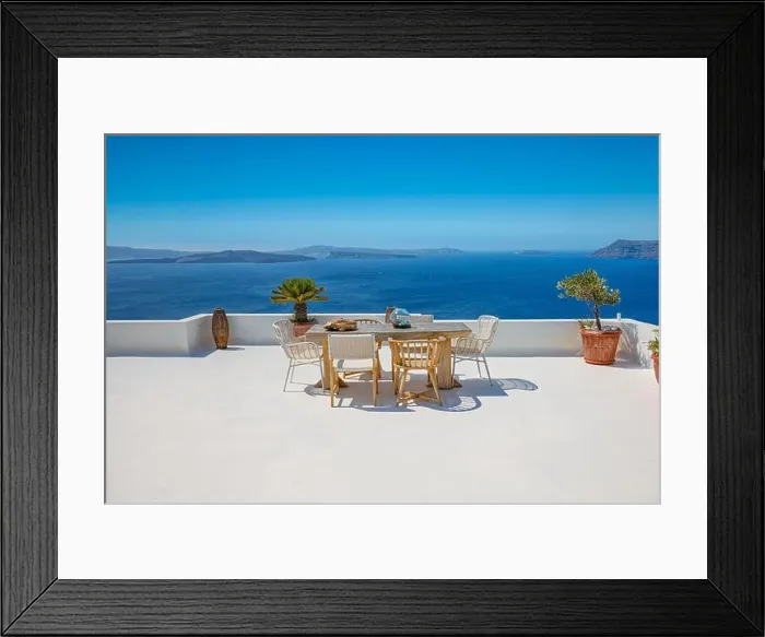 Framed Print : Beautiful Santorini landscape with white architecture and sea view. Sunny summer travel luxury background, cityscape, urban scenic. Idyllic streets Framed Print : Beautiful Santorini landscape with white architecture and sea view. Sunny summer travel luxury background, cityscape, urban scenic. Idyllic streets