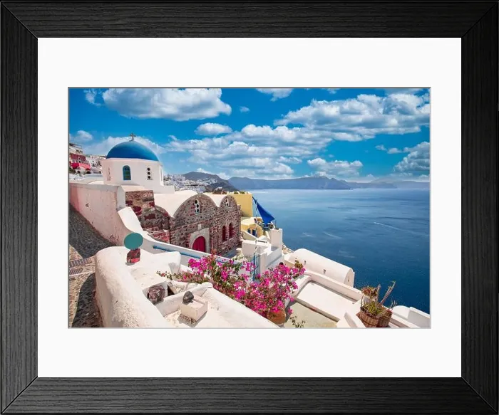 Framed Print : Greek island of Santorini. Amazing travel panorama, white houses, stairs and flowers on the streets. Idyllic summer vacation, urban landscape, tourism Framed Print : Greek island of Santorini. Amazing travel panorama, white houses, stairs and flowers on the streets. Idyllic summer vacation, urban landscape, tourism