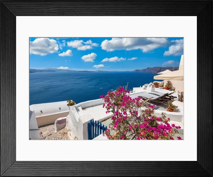 Framed Print : Greek island of Santorini. Amazing travel panorama, white houses, stairs and flowers on the streets. Idyllic summer vacation, urban landscape, tourism Framed Print : Greek island of Santorini. Amazing travel panorama, white houses, stairs and flowers on the streets. Idyllic summer vacation, urban landscape, tourism