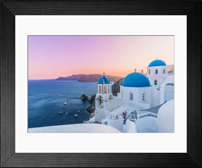 Framed Print : Idyllic summer sunset vacation, urban landscape, tourism destination scenic. Oia, Thira panoramic views. Greek island of Santorin