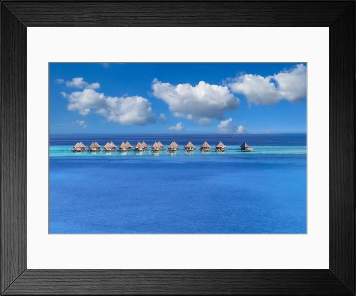 Framed Print : Maldives paradise island. Tropical aerial landscape, seascape with pier, water bungalows villas with amazing sea lagoon beach. Exotic aerial tourism Framed Print : Maldives paradise island. Tropical aerial landscape, seascape with pier, water bungalows villas with amazing sea lagoon beach. Exotic aerial tourism