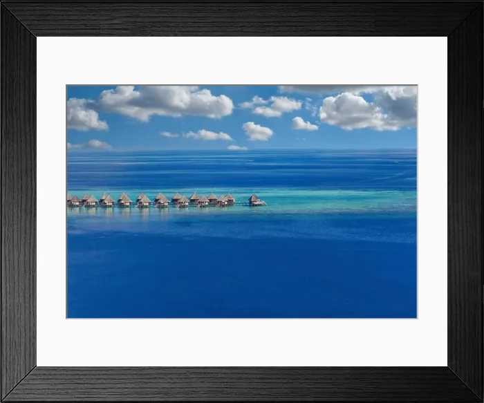 Framed Print : Maldives paradise island. Tropical aerial landscape, seascape with pier, water bungalows villas with amazing sea lagoon beach. Exotic aerial tourism Framed Print : Maldives paradise island. Tropical aerial landscape, seascape with pier, water bungalows villas with amazing sea lagoon beach. Exotic aerial tourism