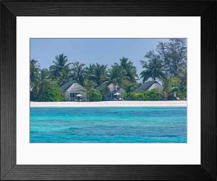 Framed Print : Luxury beach landscape with beach villas or bungalows with palm trees over white sand and blue sky. Summer travel and vacation view, islands beach Framed Print : Luxury beach landscape with beach villas or bungalows with palm trees over white sand and blue sky. Summer travel and vacation view, islands beach
