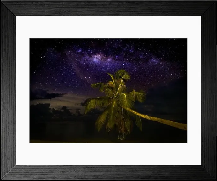 Framed Print : Milky Way over the sandy beach with palm trees, night in summer. Landscape with sea coast, beautiful blue starry sky Framed Print : Milky Way over the sandy beach with palm trees, night in summer. Landscape with sea coast, beautiful blue starry sky