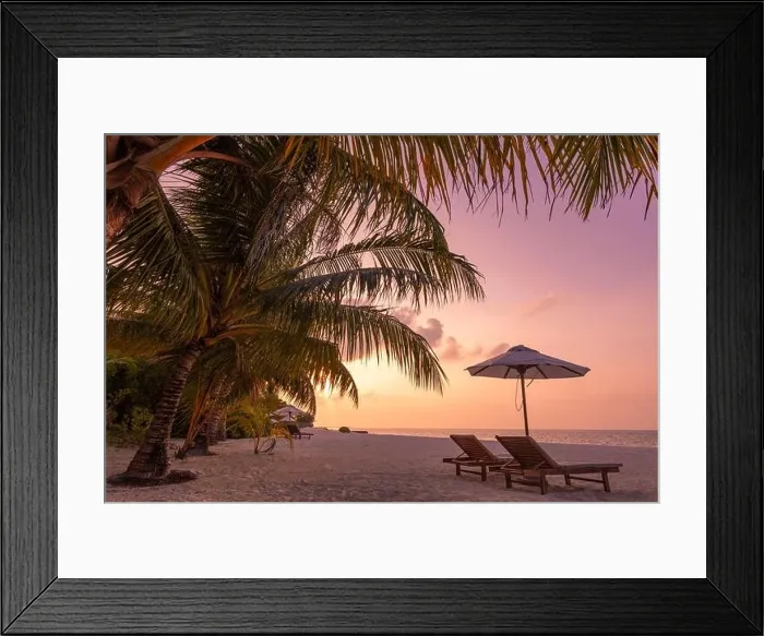 Framed Print : Beautiful tropical sunset scenery, two sun beds loungers umbrella palm tree. White sand, sea view with horizon, colorful twilight sky, beach resort Framed Print : Beautiful tropical sunset scenery, two sun beds loungers umbrella palm tree. White sand, sea view with horizon, colorful twilight sky, beach resort