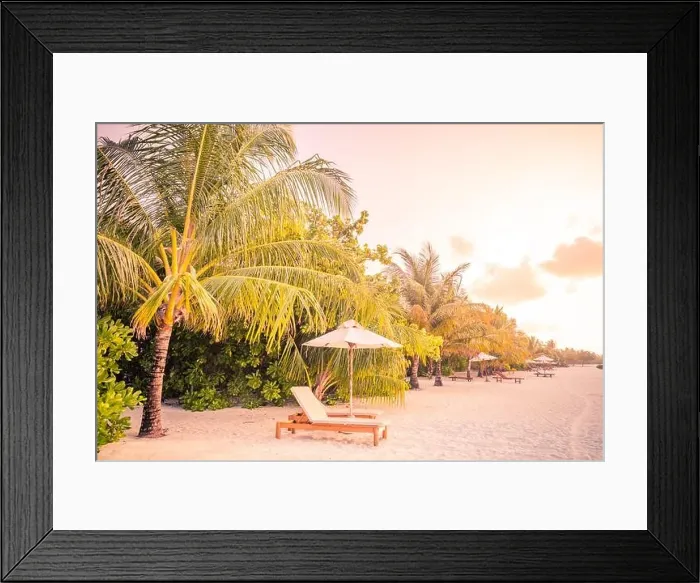 Framed Print : Sunset beach landscape, couple travel honeymoon destination. Luxury holiday summer vacation tropical island view close to sea. Loungers umbrella chair Framed Print : Sunset beach landscape, couple travel honeymoon destination. Luxury holiday summer vacation tropical island view close to sea. Loungers umbrella chair