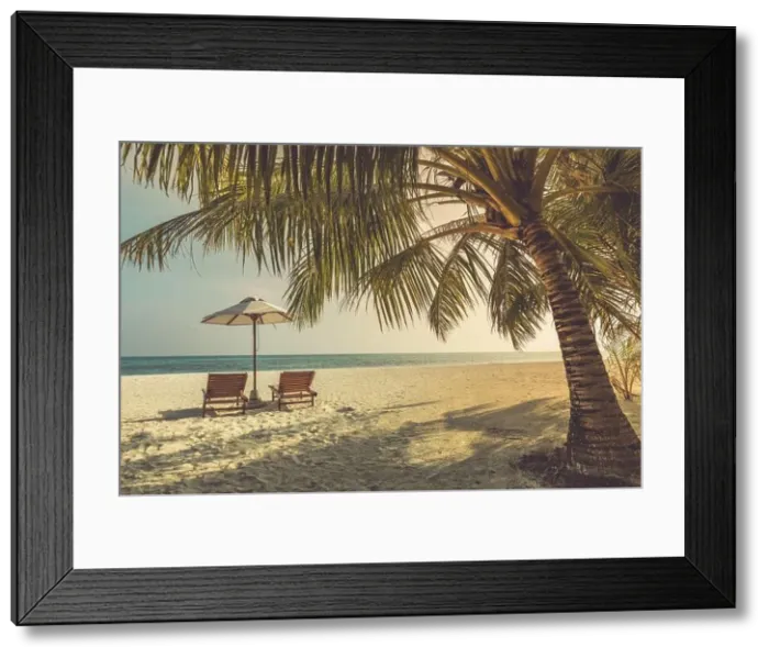 Framed Print : Beautiful tropical outdoor beach sea ocean with umbrella and chair. Landscape close to sea at sunset sunrise time for exotic summer travel vacation