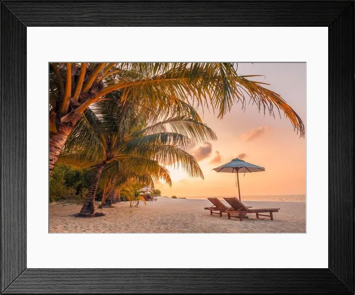 Framed Print : Beautiful tropical sunset scenery, two sun beds loungers umbrella palm tree. White sand, sea view with horizon, colorful twilight sky, beach resort Framed Print : Beautiful tropical sunset scenery, two sun beds loungers umbrella palm tree. White sand, sea view with horizon, colorful twilight sky, beach resort