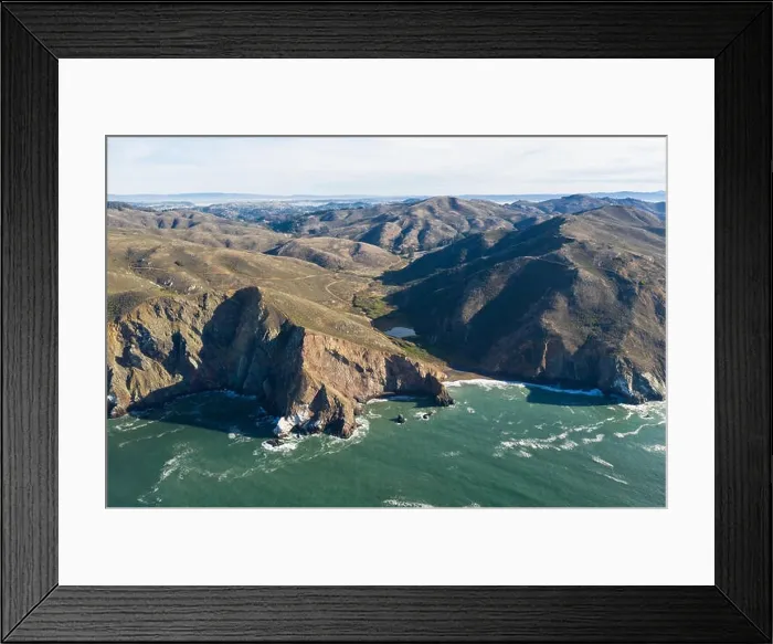 Framed Print : Seen from an aerial perspective, the cold waters of the Pacific Ocean wash against the rocky Northern California coastline in Marin Framed Print : Seen from an aerial perspective, the cold waters of the Pacific Ocean wash against the rocky Northern California coastline in Marin