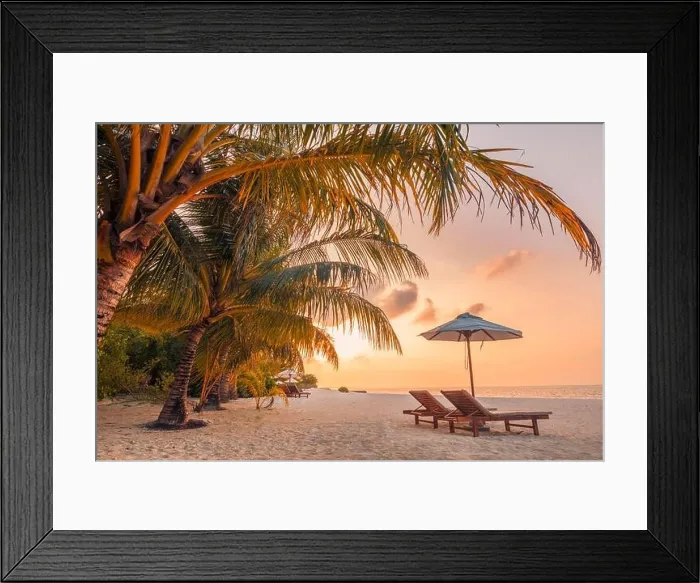 Framed Print : Beautiful tropical sunset scenery, two sun beds loungers umbrella palm tree. White sand, sea view with horizon, colorful twilight sky, beach resort Framed Print : Beautiful tropical sunset scenery, two sun beds loungers umbrella palm tree. White sand, sea view with horizon, colorful twilight sky, beach resort