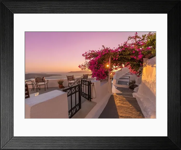 Framed Print : Summer sunset vacation scenic of luxury famous Europe destination. White architecture in Santorini, Greece. Stunning travel scenery with pink flowers Framed Print : Summer sunset vacation scenic of luxury famous Europe destination. White architecture in Santorini, Greece. Stunning travel scenery with pink flowers