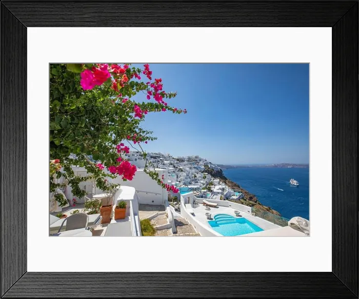 Framed Print : Beautiful panoramic street view on the mediterranean blue sea, caldera and volcano. Traditional white architecture of Santorini island, Thira, Greece Framed Print : Beautiful panoramic street view on the mediterranean blue sea, caldera and volcano. Traditional white architecture of Santorini island, Thira, Greece