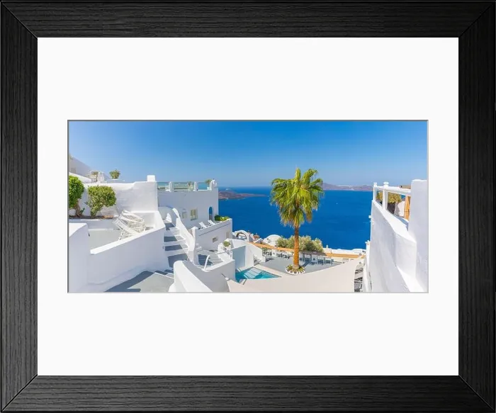Framed Print : Beautiful panoramic street view on the mediterranean blue sea, caldera and volcano. Traditional white architecture of Santorini island, Thira, Greece Framed Print : Beautiful panoramic street view on the mediterranean blue sea, caldera and volcano. Traditional white architecture of Santorini island, Thira, Greece