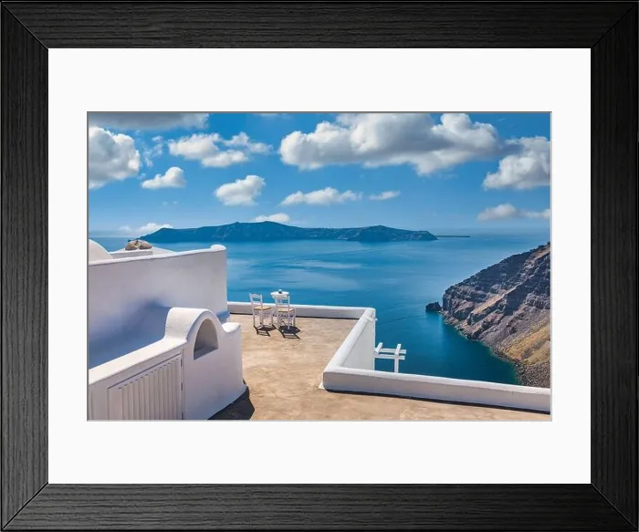 Framed Print : Santorini island caldera view with chairs and white architecture, romantic mood, couple travel vacation landscape destination scenic. Tourism view Framed Print : Santorini island caldera view with chairs and white architecture, romantic mood, couple travel vacation landscape destination scenic. Tourism view