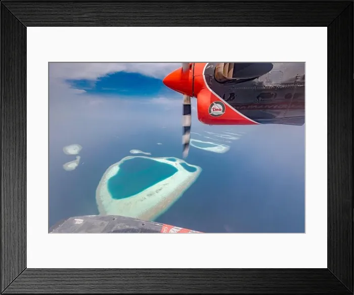 Framed Print : Maldives beach from birds eye view. Aerial view on Maldives island. Tropical islands and atolls in Maldives from aerial view. Summer holiday Framed Print : Maldives beach from birds eye view. Aerial view on Maldives island. Tropical islands and atolls in Maldives from aerial view. Summer holiday
