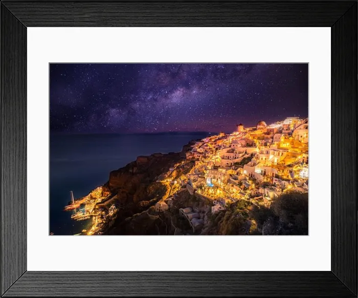 Framed Print : Oia village at night, Santorini island. Famous travel landscape, luxury vacation destination scenic. Beautiful view of fabulous picturesque village Framed Print : Oia village at night, Santorini island. Famous travel landscape, luxury vacation destination scenic. Beautiful view of fabulous picturesque village