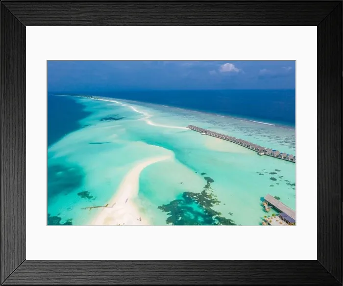 Framed Print : Atolls and islands in Maldives with jetty and over water villas. Luxury summer holiday vacation, white sand, blue sea, idyllic tropical island beach Framed Print : Atolls and islands in Maldives with jetty and over water villas. Luxury summer holiday vacation, white sand, blue sea, idyllic tropical island beach