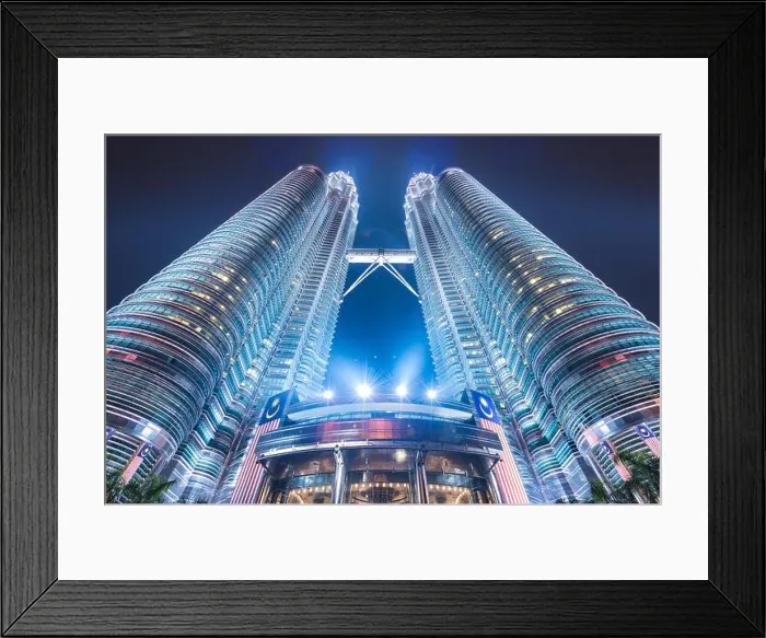 Framed Print : KUALA LUMPUR - SEPTEMBER 16, 2015: The Petronas Towers viewed from below at night Framed Print : KUALA LUMPUR - SEPTEMBER 16, 2015: The Petronas Towers viewed from below at night