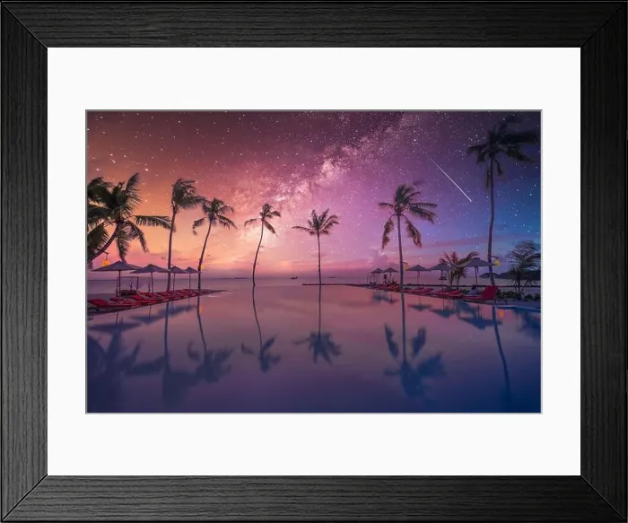 Framed Print : Reflection chairs around infinity swimming pool near sea ocean with palm trees beach at night sunset time. Lifestyle leisure carefree travel vacation Framed Print : Reflection chairs around infinity swimming pool near sea ocean with palm trees beach at night sunset time. Lifestyle leisure carefree travel vacation