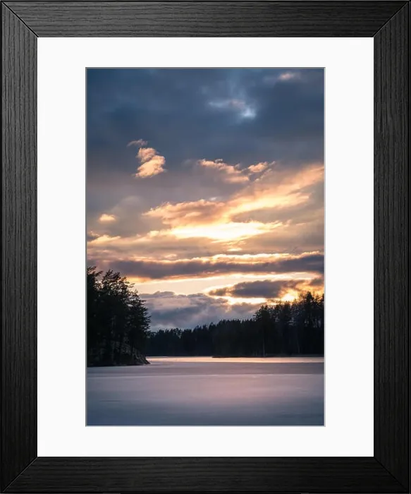 Framed Print : Scenic landscape with dramatic sky and sunset at evening in Finland Framed Print : Scenic landscape with dramatic sky and sunset at evening in Finland