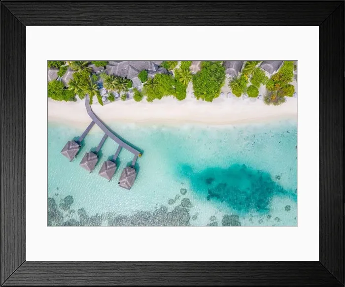 Framed Print : Perfect aerial landscape, luxury tropical resort or hotel with water villas and beautiful beach scenery. Amazing bird eyes view in Maldives, landscape Framed Print : Perfect aerial landscape, luxury tropical resort or hotel with water villas and beautiful beach scenery. Amazing bird eyes view in Maldives, landscape