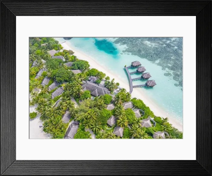 Framed Print : Perfect aerial landscape, luxury tropical resort or hotel with water villas and beautiful beach scenery. Amazing bird eyes view in Maldives, landscape