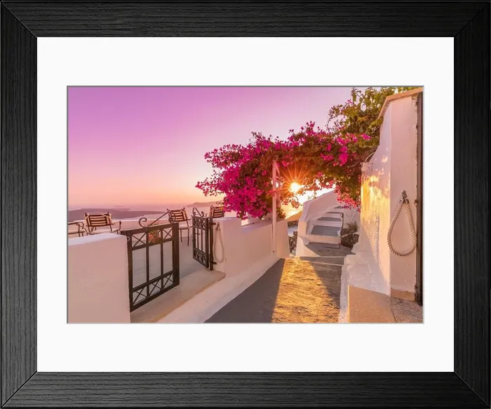 Framed Print : Santorini island sunset. Caldera view with street and flowers, romantic mood, couple travel vacation landscape destination scenic. Love wallpaper Framed Print : Santorini island sunset. Caldera view with street and flowers, romantic mood, couple travel vacation landscape destination scenic. Love wallpaper
