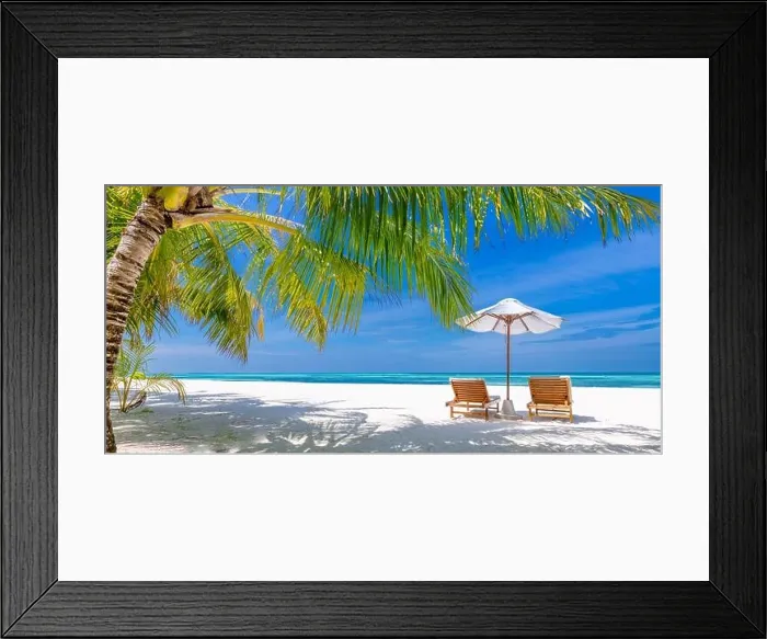 Framed Print : Tropical beach background as summer landscape with lounge chairs and palm trees and calm sea for beach banner. Summer travel destination Framed Print : Tropical beach background as summer landscape with lounge chairs and palm trees and calm sea for beach banner. Summer travel destination