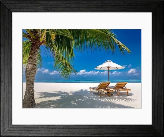 Framed Print : Tropical beach background as summer landscape with lounge chairs and palm trees and calm sea for beach banner. Summer travel destination Framed Print : Tropical beach background as summer landscape with lounge chairs and palm trees and calm sea for beach banner. Summer travel destination