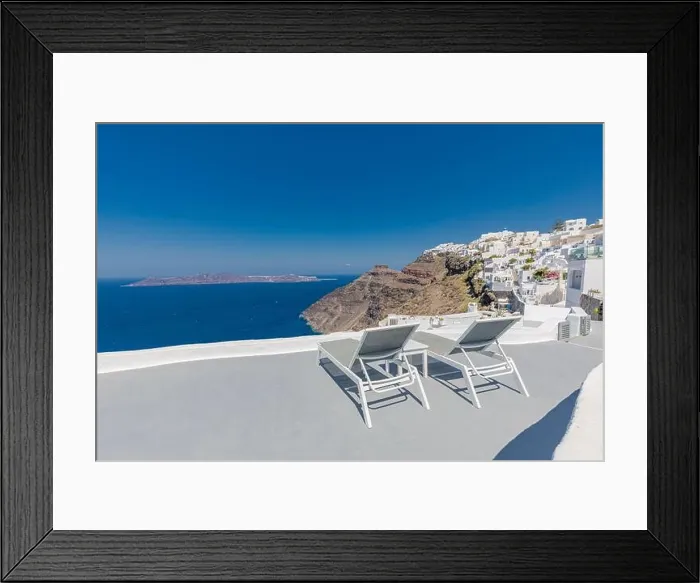 Framed Print : Beautiful Santorini terrace landscape, white architecture with sunny caldera view. Famous tourist hotel resort, travel vacation destination Framed Print : Beautiful Santorini terrace landscape, white architecture with sunny caldera view. Famous tourist hotel resort, travel vacation destination