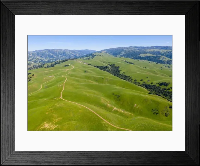 Framed Print : An aerial view of rolling hills in Northern California's tri-valley region shows lush, green grass that flourished after a wet winter Framed Print : An aerial view of rolling hills in Northern California's tri-valley region shows lush, green grass that flourished after a wet winter