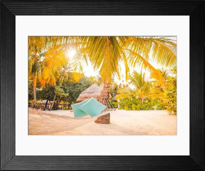 Framed Print : Hammock and pillows between two palm trees on the beach during sunset time. Tranquility and calmness, summer beach vacation travel view, sun rays Framed Print : Hammock and pillows between two palm trees on the beach during sunset time. Tranquility and calmness, summer beach vacation travel view, sun rays