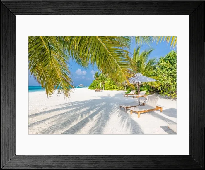 Framed Print : Tropical beach background as summer landscape with lounge chairs and palm trees and calm sea for beach banner. Summer travel destination